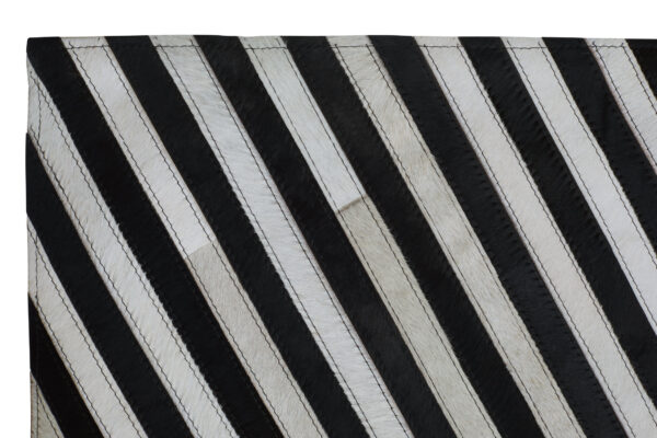 Bosie Safira Large Black And White Hair on Leather Rug