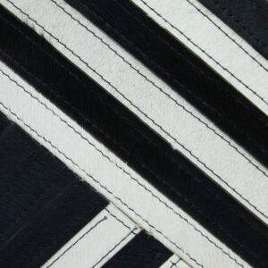 Bosie Safira Black and White Hair on Leather Cushion