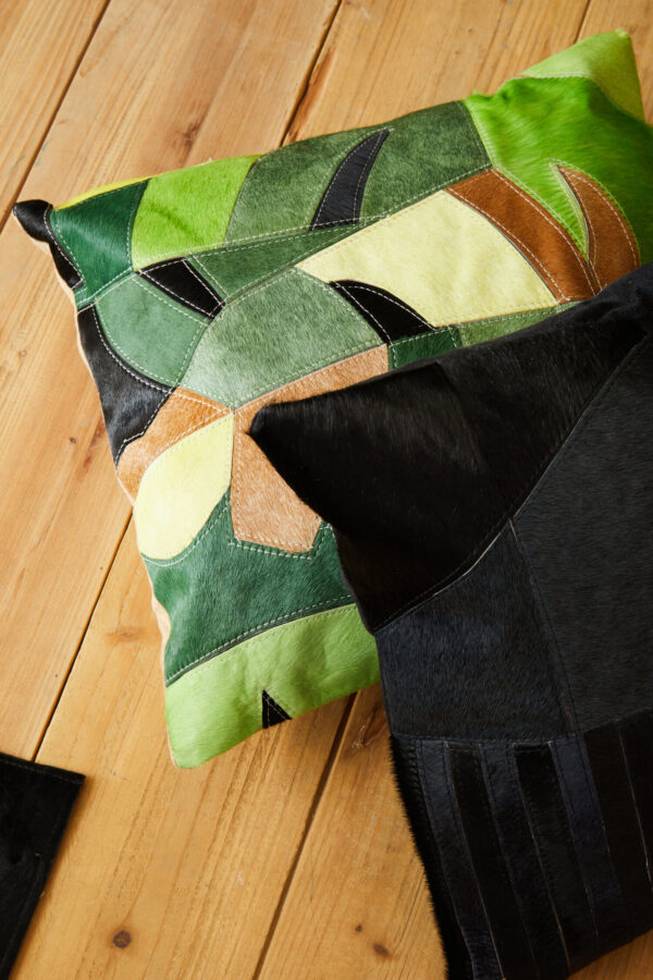 Bosie Safira Black And Grey Hair on Leather Cushion