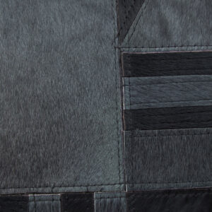 Bosie Safira Black And Grey Hair on Leather Cushion